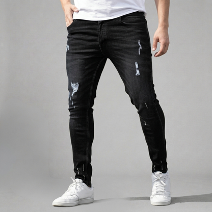 Tymon - Męskie obcisłe jeansy z przetarciami